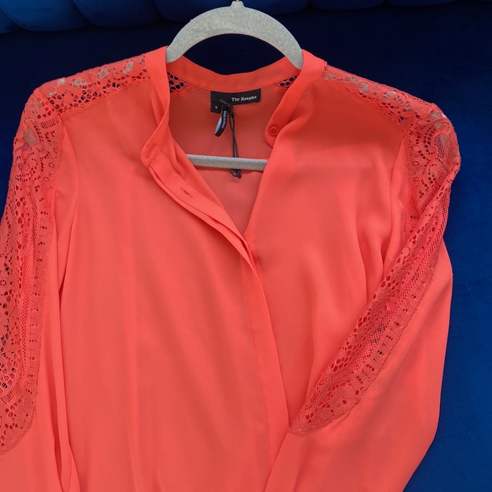 Gorgeous coral blouse with sleeve detail